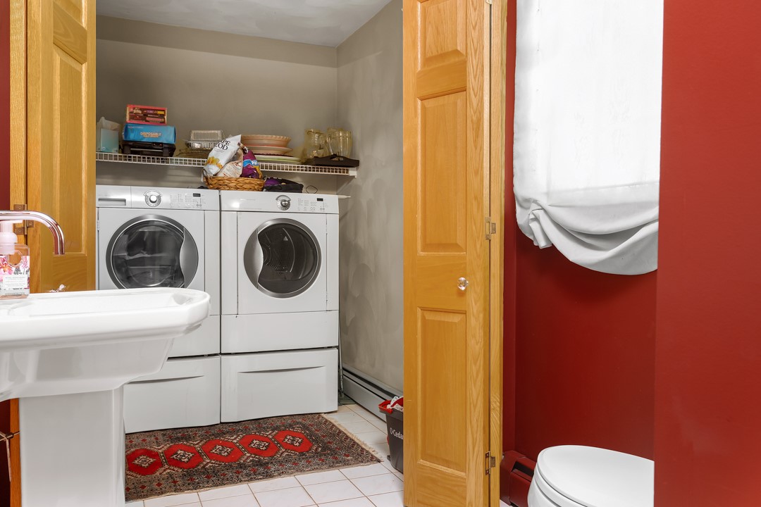 50 Sundale Road Cranston, RI 02921 - Photo 13 of 34 first floor laundry area in half bath; close access to rear deck