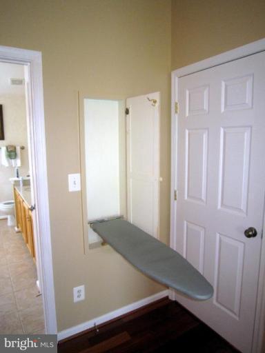 42751 Middle Ridge Place Broadlands, VA 20148 - Photo 22 of 30 Custom Closet for Iron Board