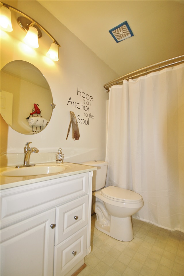 201 William Road Ruckersville, VA 22968 - Photo 13 of 23 a bathroom with a sink mirror vanity and toilet