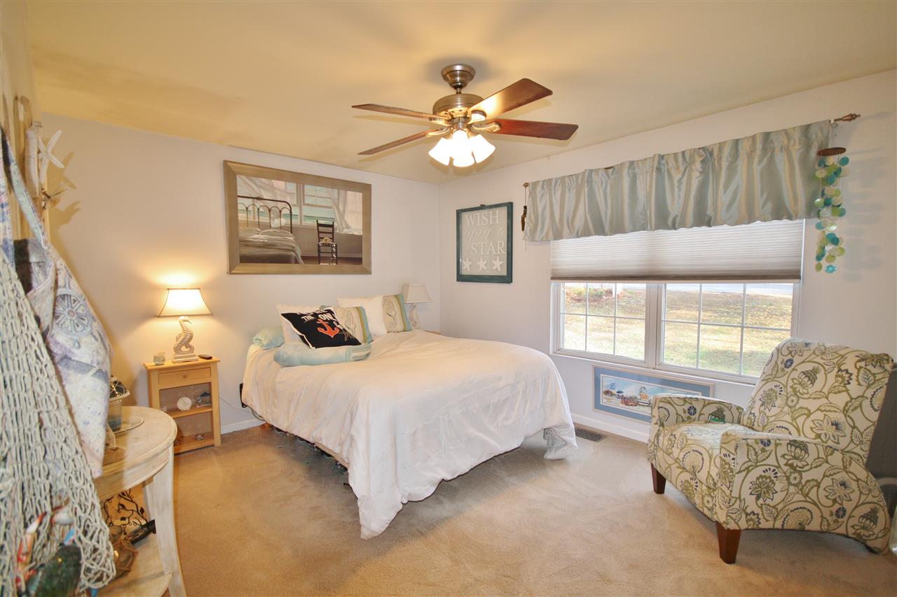 201 William Road Ruckersville, VA 22968 - Photo 14 of 23 a bedroom with a bed and a couch