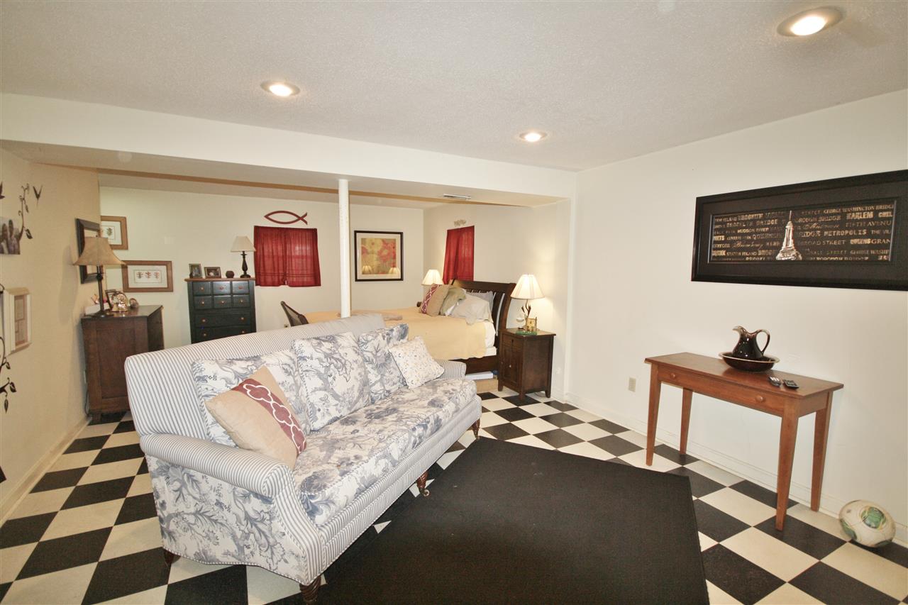 201 William Road Ruckersville, VA 22968 - Photo 15 of 23 a living room with furniture and paintings on the wall