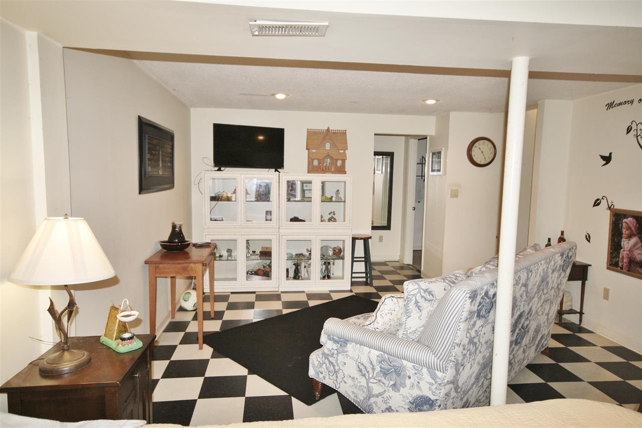 201 William Road Ruckersville, VA 22968 - Photo 17 of 23 a living room with furniture and a flat screen tv