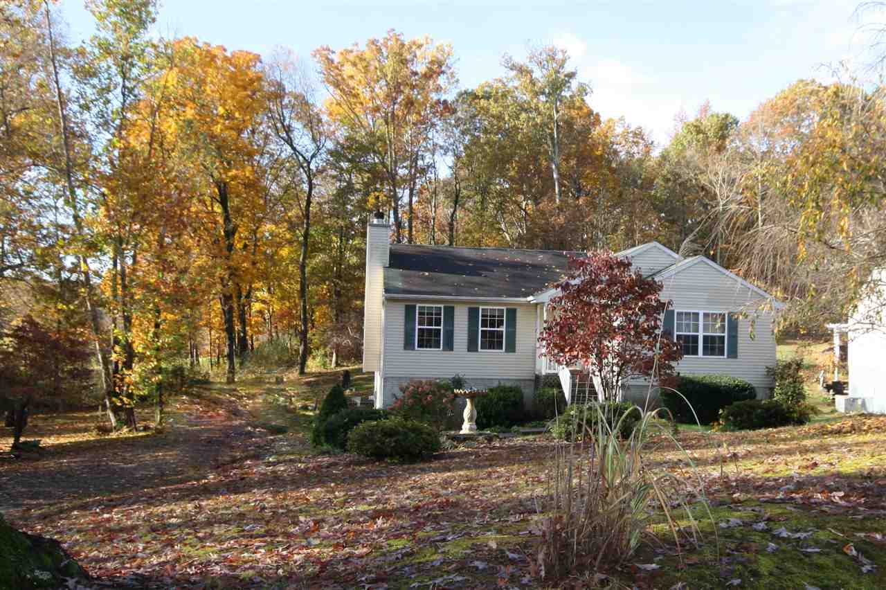 201 William Road Ruckersville, VA 22968 - Photo 23 of 23 a front view of a house with a yard tree and outdoor seating