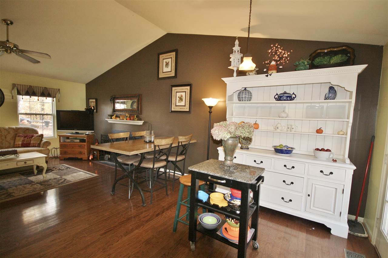 201 William Road Ruckersville, VA 22968 - Photo 8 of 23 a view of a dining room with furniture and wooden floor