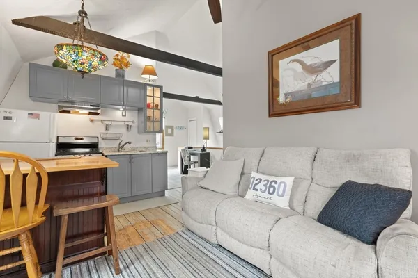 a living room with furniture and a table