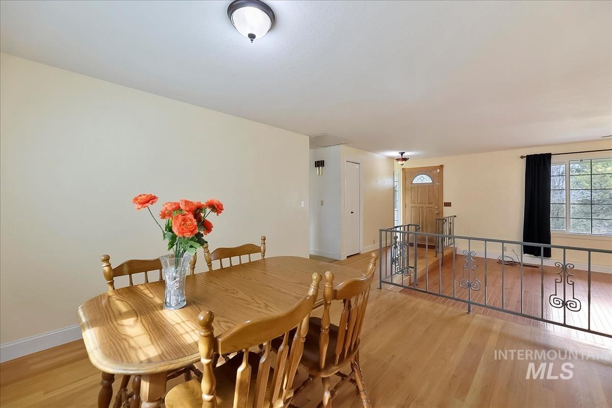 11875 West Hidden Valley Rim Road Boise, ID 83709 - Photo 11 of 36 Dining area featuring light wood-type flooring
