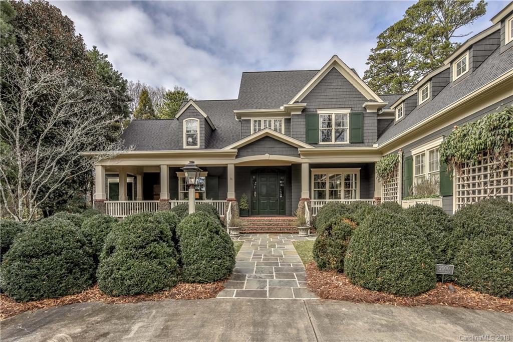 2000 Harris Road Charlotte, NC 28211 - Photo 2 of 34 a front view of a house with garden