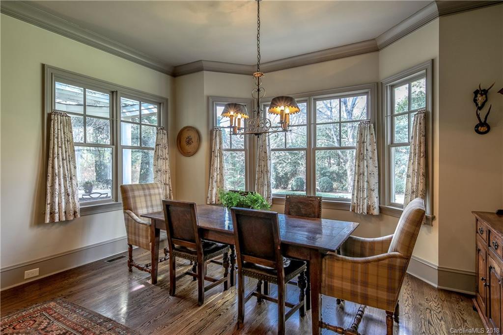 2000 Harris Road Charlotte, NC 28211 - Photo 12 of 34 a dining room with furniture window wooden floor