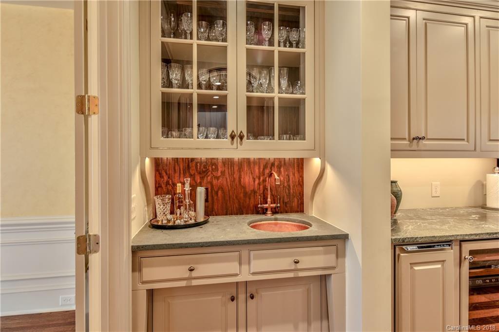 2000 Harris Road Charlotte, NC 28211 - Photo 13 of 34 a kitchen with a sink and cabinets