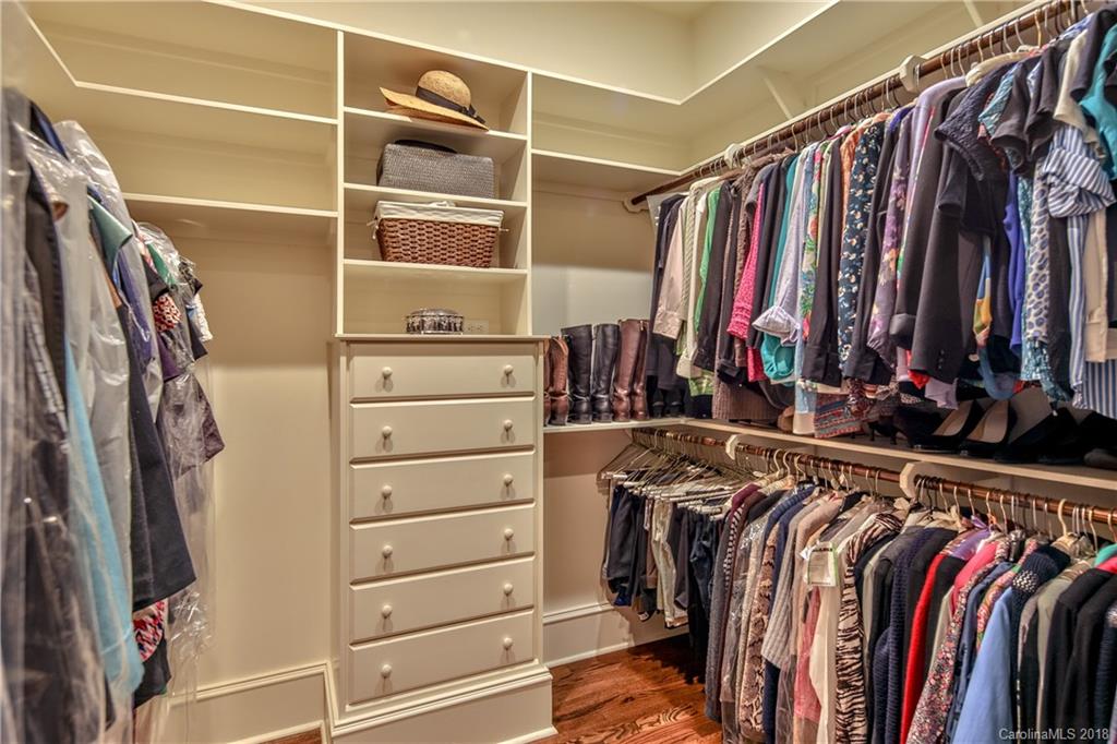 2000 Harris Road Charlotte, NC 28211 - Photo 21 of 34 a view of walk in closet with clothes