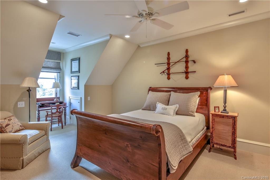 2000 Harris Road Charlotte, NC 28211 - Photo 23 of 34 a bedroom with a bed couch and window