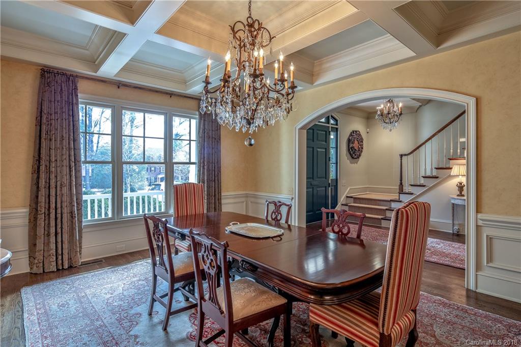 2000 Harris Road Charlotte, NC 28211 - Photo 5 of 34 a dining room with furniture a chandelier and window