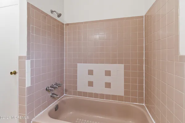 a view of a storage & utility room with closet