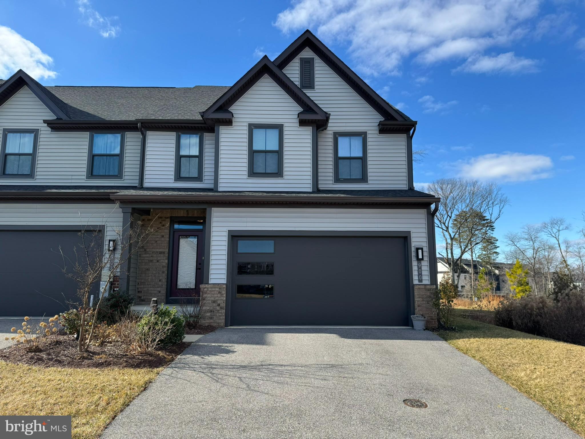900 Sankofa Road Glen Burnie, MD 21060 - Photo 1 of 6 a front view of a house with garden