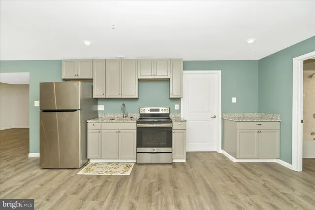 a view of a balcony with wooden floor