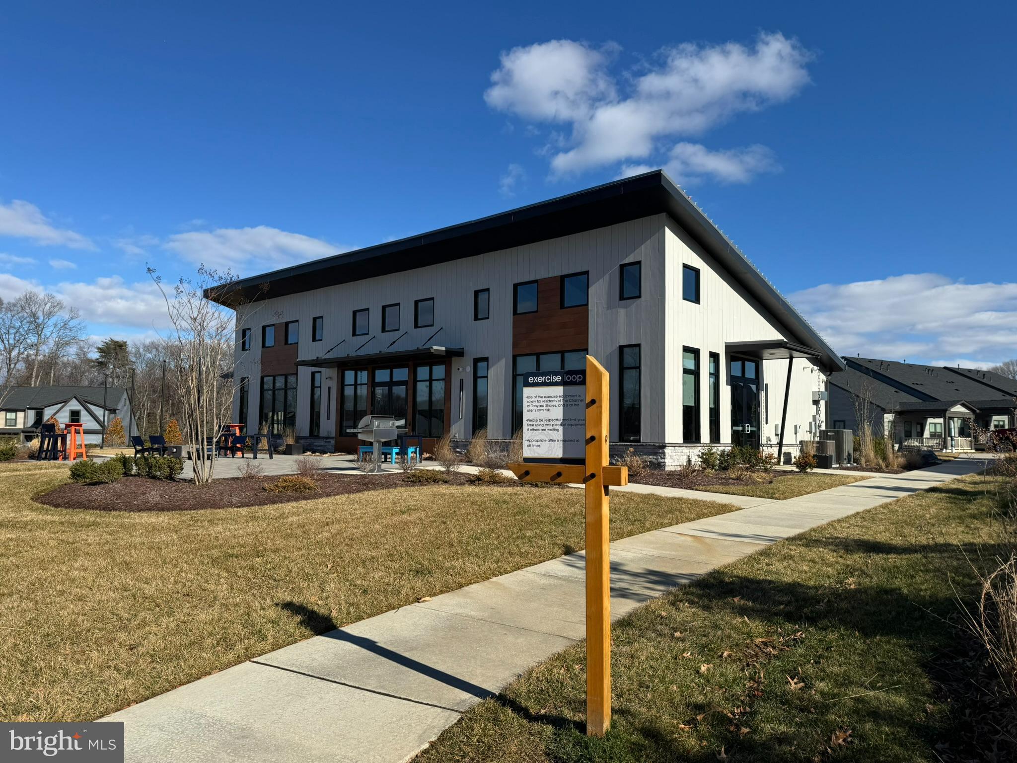 900 Sankofa Road Glen Burnie, MD 21060 - Photo 5 of 6 a front view of a house with a yard