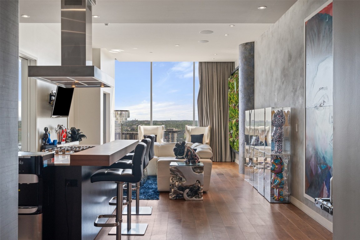 210 Lavaca Street, Unit 2203 Austin, TX 78701 - Photo 1 of 30 a living room with furniture and large windows