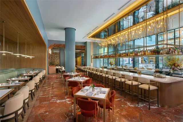 a city street filled with lots of furniture and windows