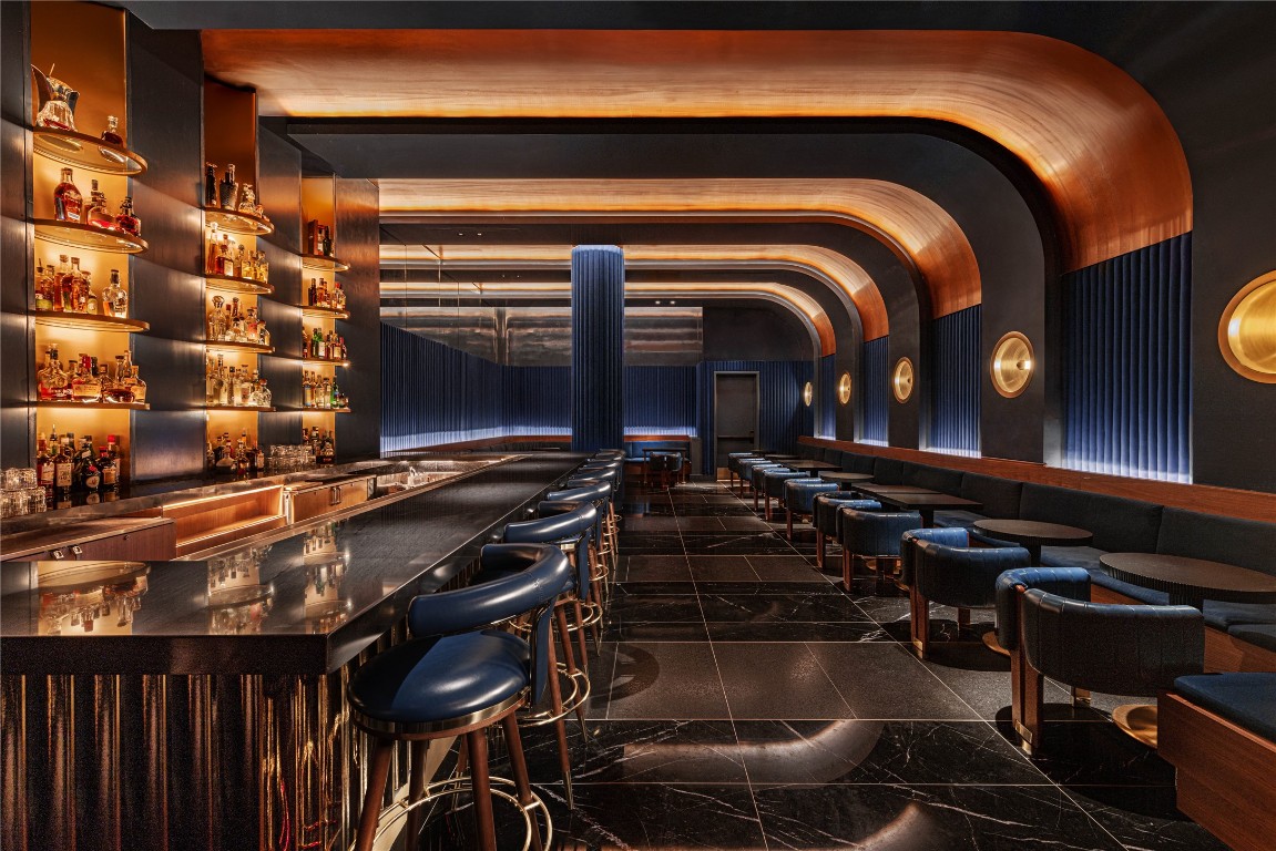 210 Lavaca Street, Unit 2203 Austin, TX 78701 - Photo 18 of 30 a close view of water heater and wooden cabinets