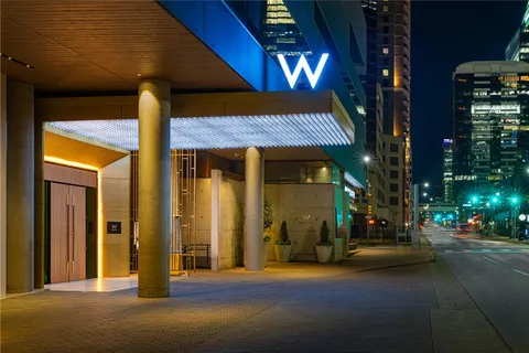 a view of a building with brick walls