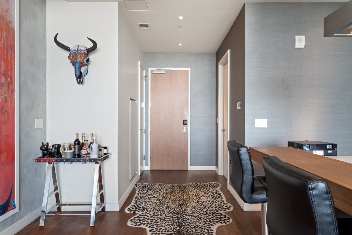 210 Lavaca Street, Unit 2203 Austin, TX 78701 - Photo 22 of 30 a view of hallway with furniture and wooden floor