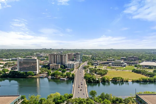 a view of a lake with a city