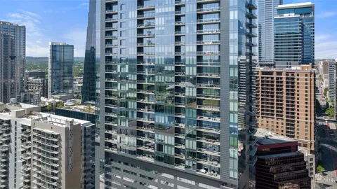 a view of a city with tall buildings