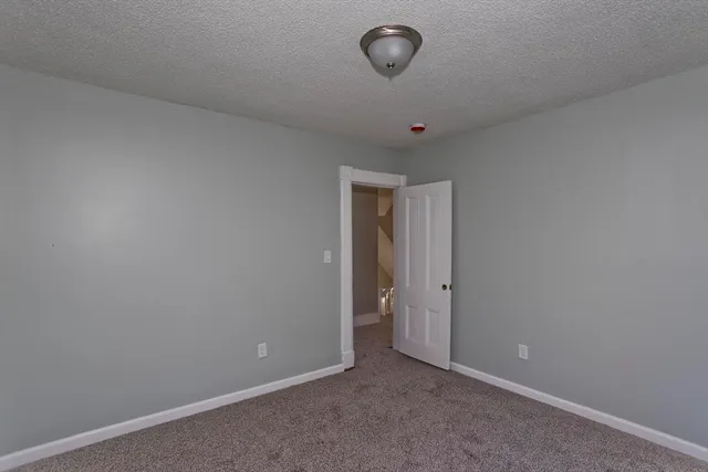 a view of a room with a fan