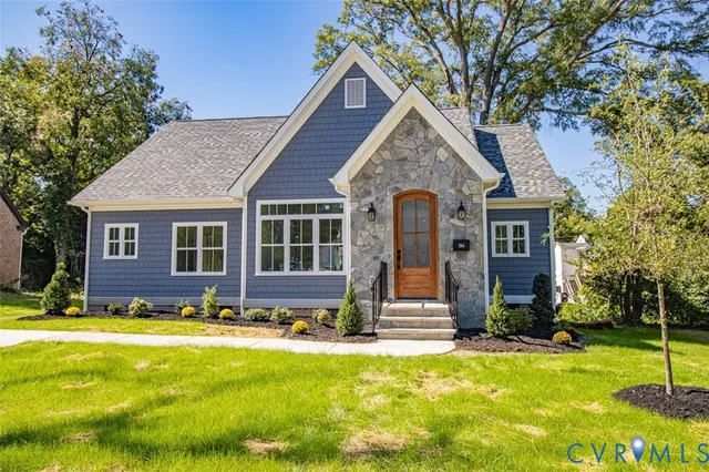 a view of a house with swimming pool