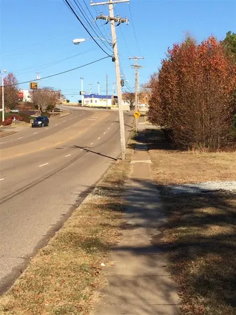 a view of a parking space near a road