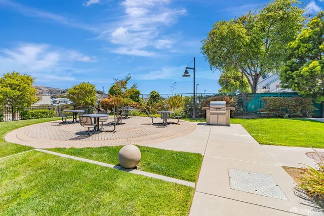 a view of a building with potted plants