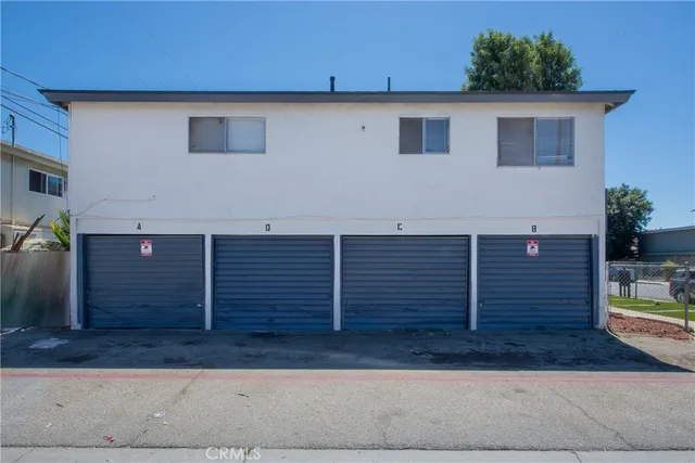 a view of a house with a garage