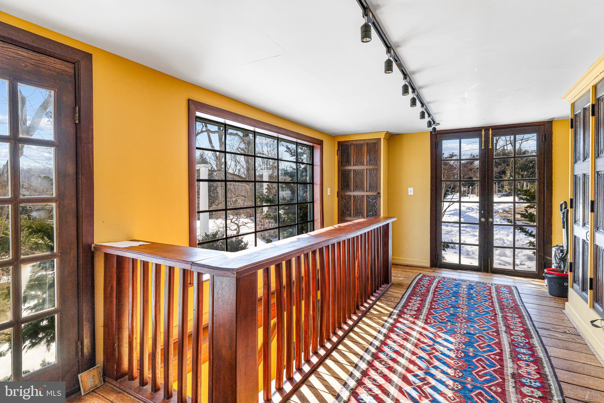 1260 County Line Road Wayne, PA 19087 - Photo 23 of 64 a view of a balcony with wooden floor