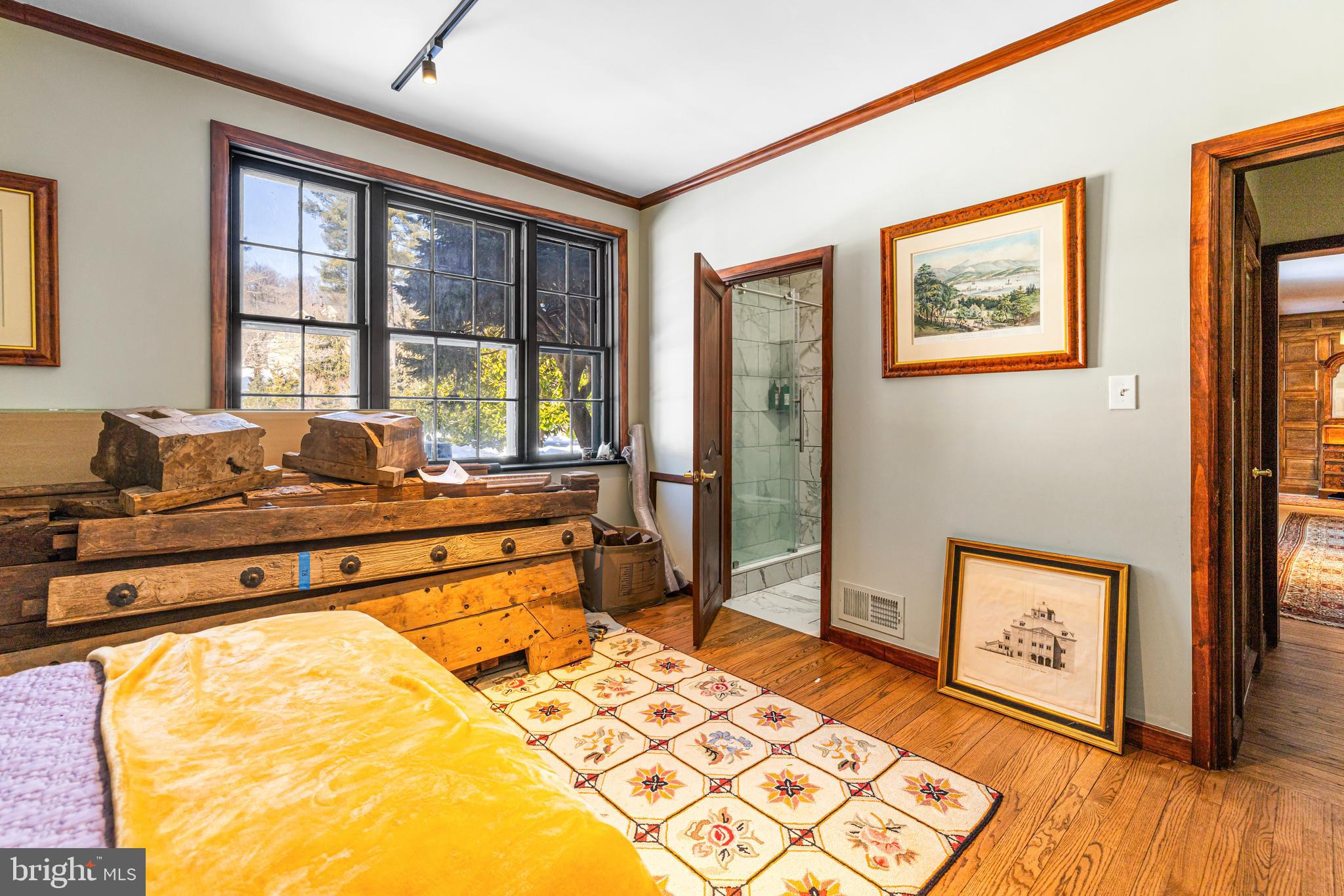 1260 County Line Road Wayne, PA 19087 - Photo 26 of 64 a room with a bed and wooden floor