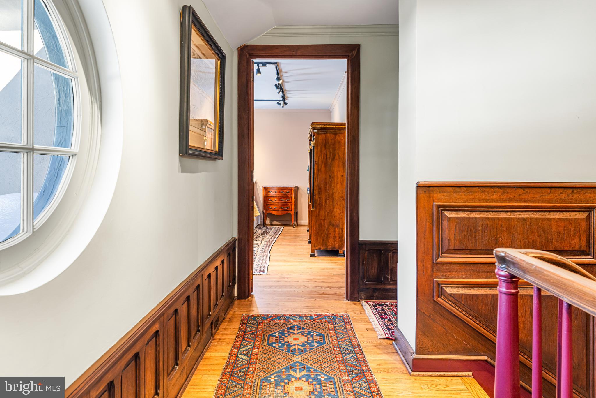 1260 County Line Road Wayne, PA 19087 - Photo 43 of 64 a view of a hallway with wooden floor and staircase