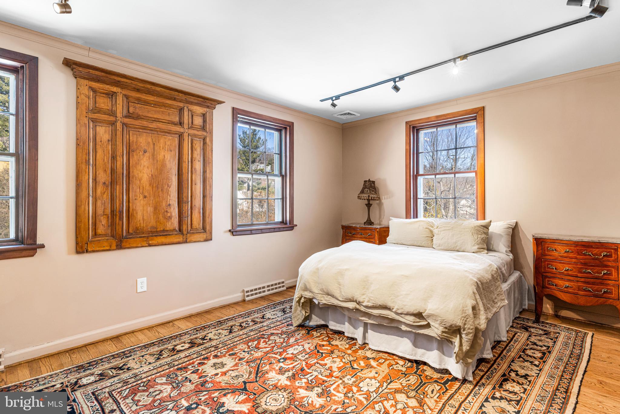 1260 County Line Road Wayne, PA 19087 - Photo 44 of 64 a bedroom with a bed and a window