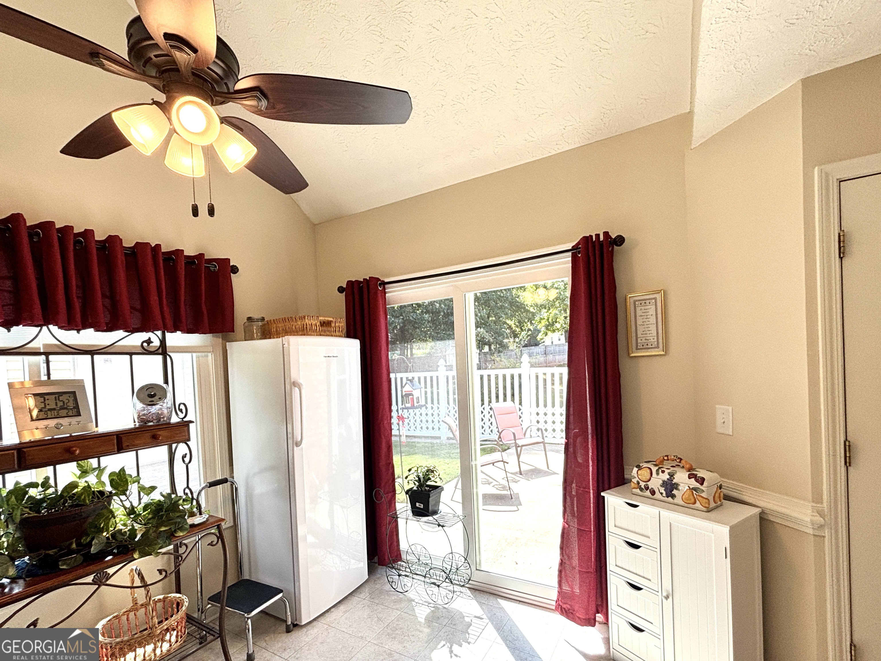 1102 Strath Clyde Way McDonough, GA 30253 - Photo 11 of 23 a view of a dining room with furniture window and outside view
