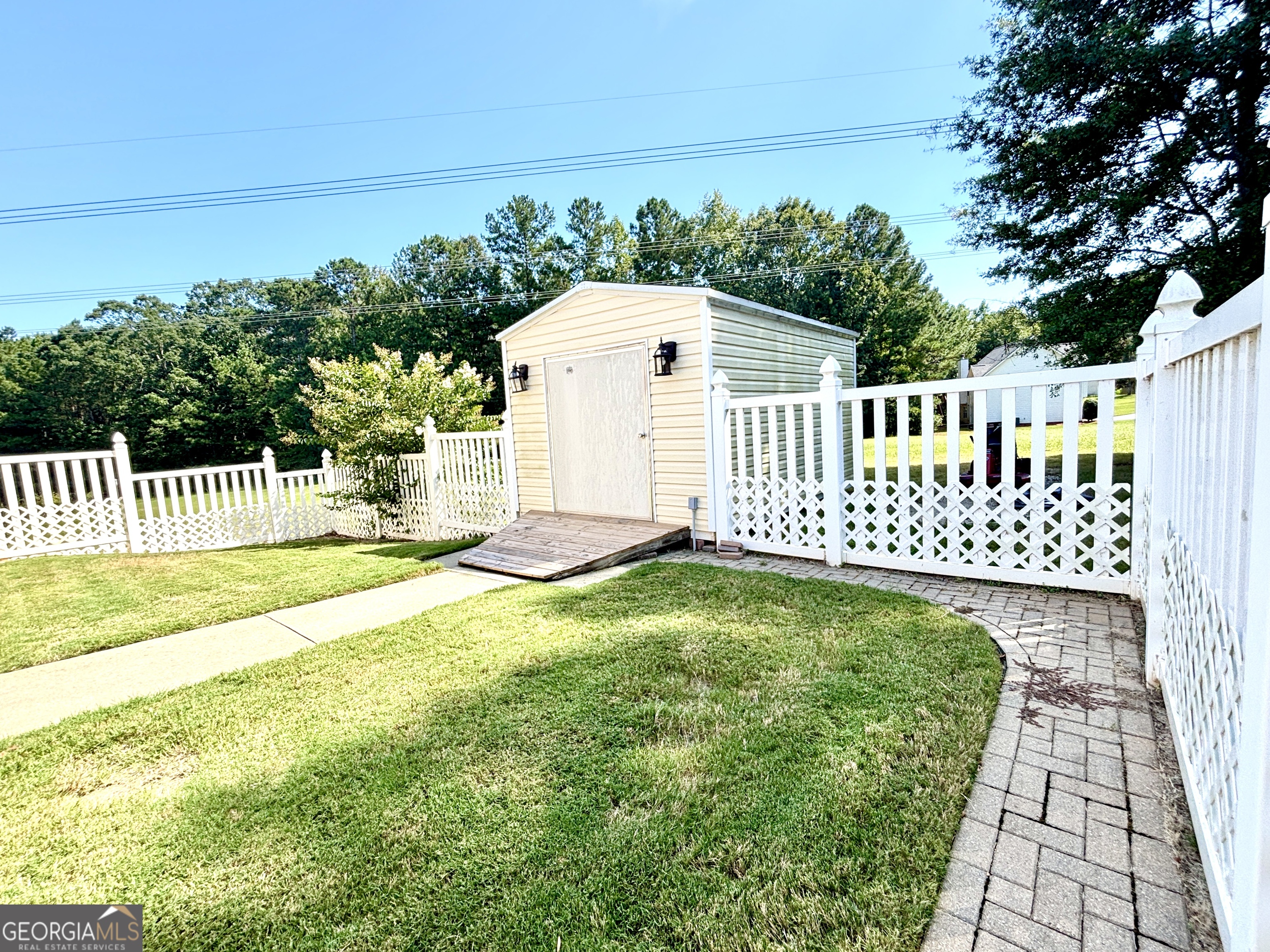 1102 Strath Clyde Way McDonough, GA 30253 - Photo 13 of 23 a view of a wrought iron fences