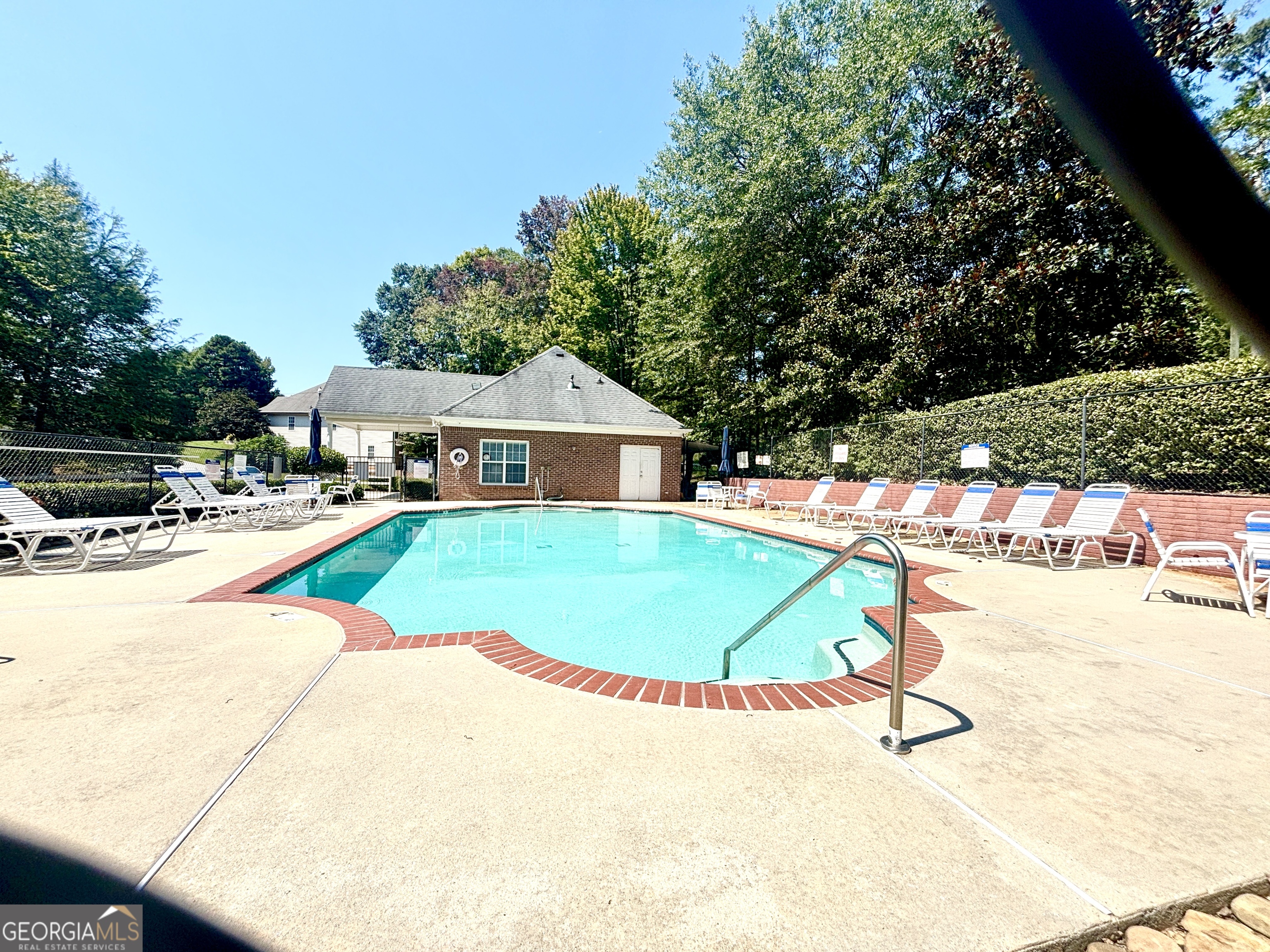 1102 Strath Clyde Way McDonough, GA 30253 - Photo 20 of 23 a view of a swimming pool with a patio