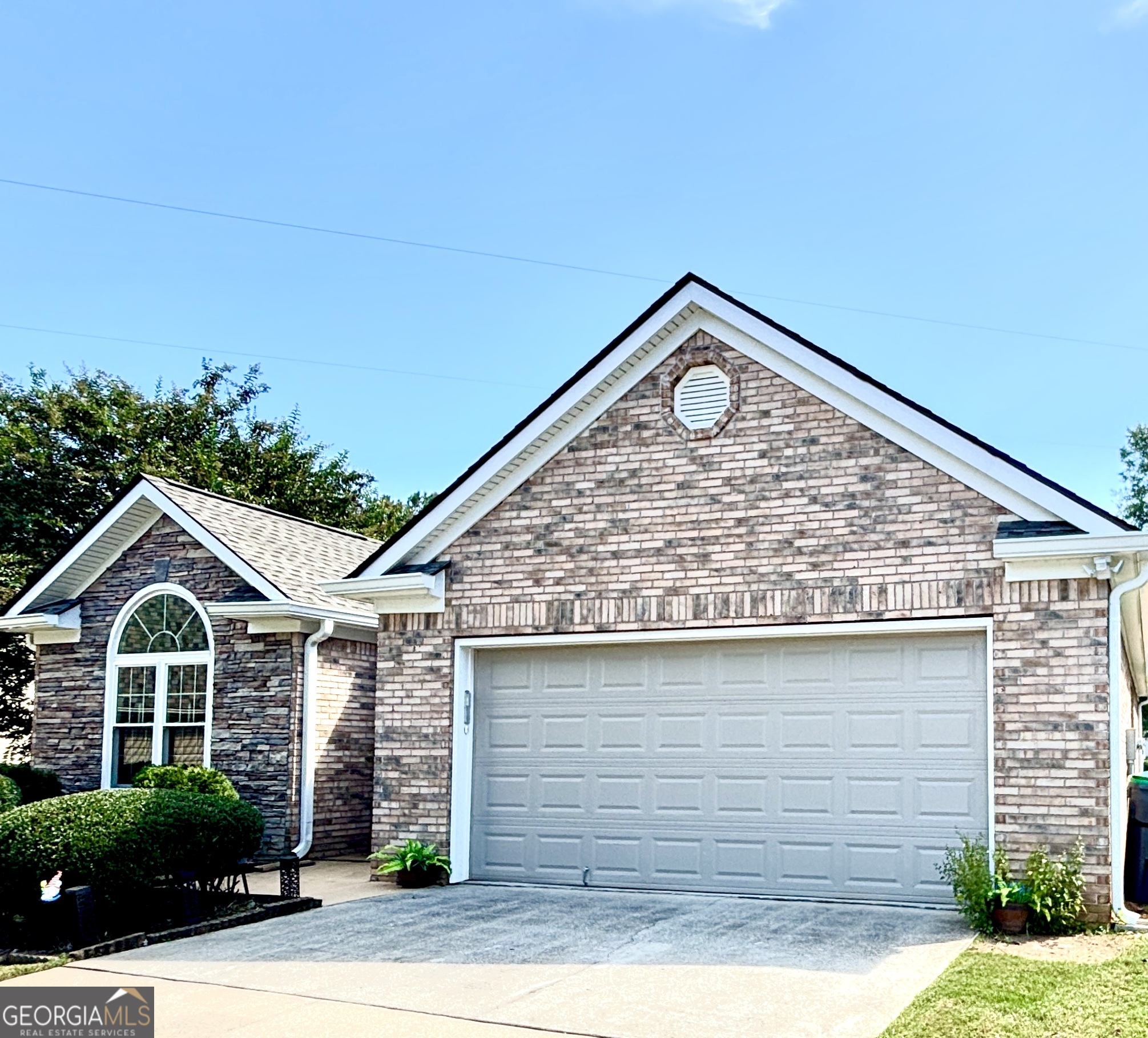1102 Strath Clyde Way McDonough, GA 30253 - Photo 3 of 23 a front view of a house with garden