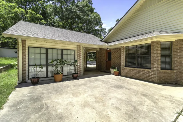 a house with yard in front of it