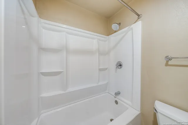 a bathroom with a bathtub