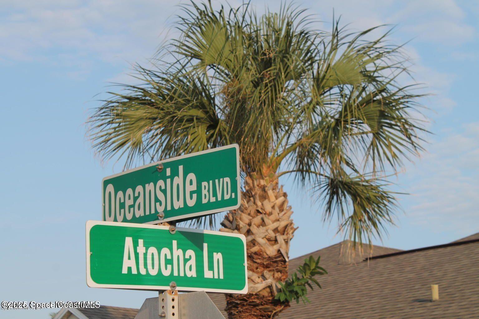 3121 Atocha Lane Indialantic, FL 32903 - Photo 16 of 17 a sign that is on a wall