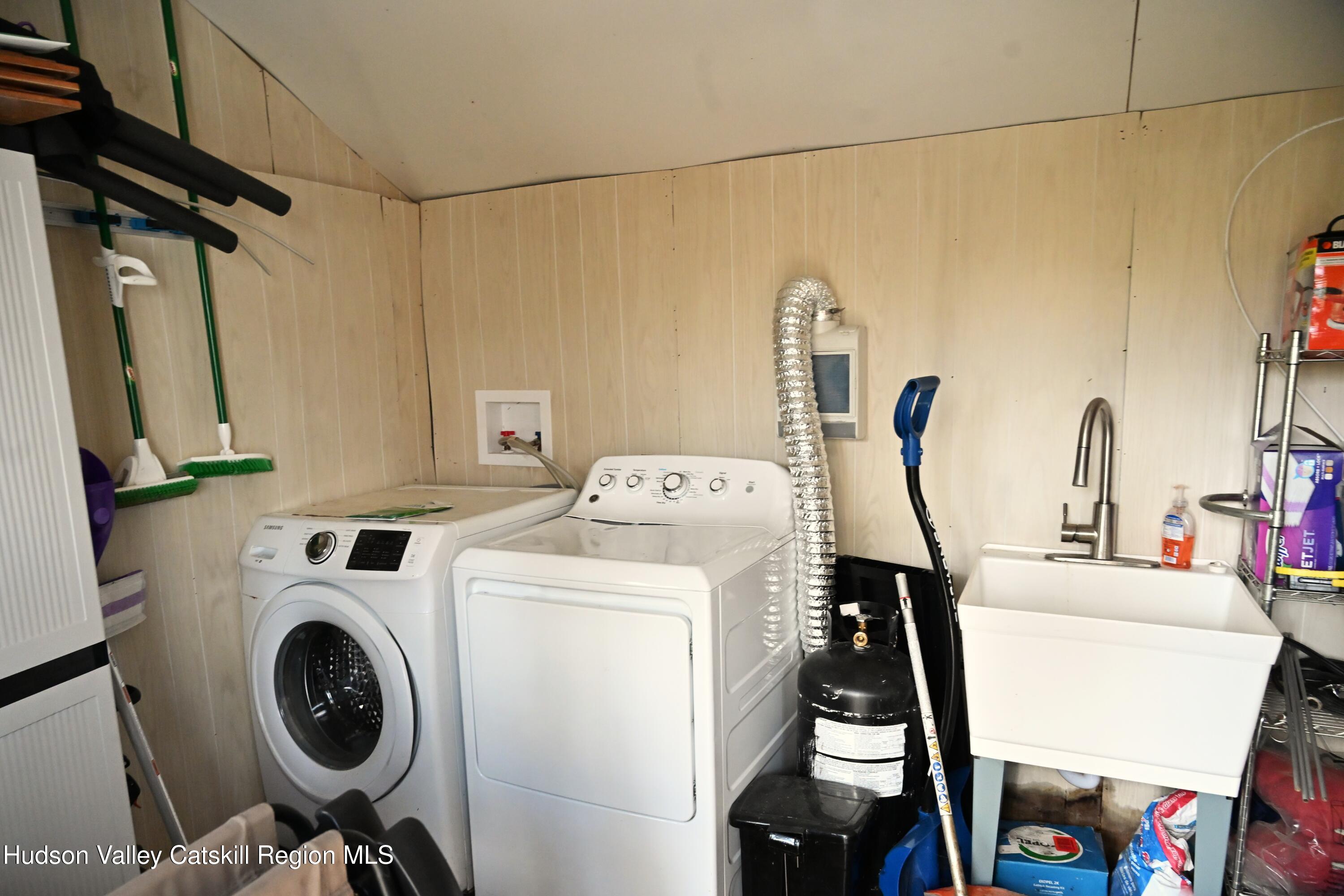 275 Creek Locks Road Rosendale, NY 12472 - Photo 18 of 23 a utility room with dryer and washer