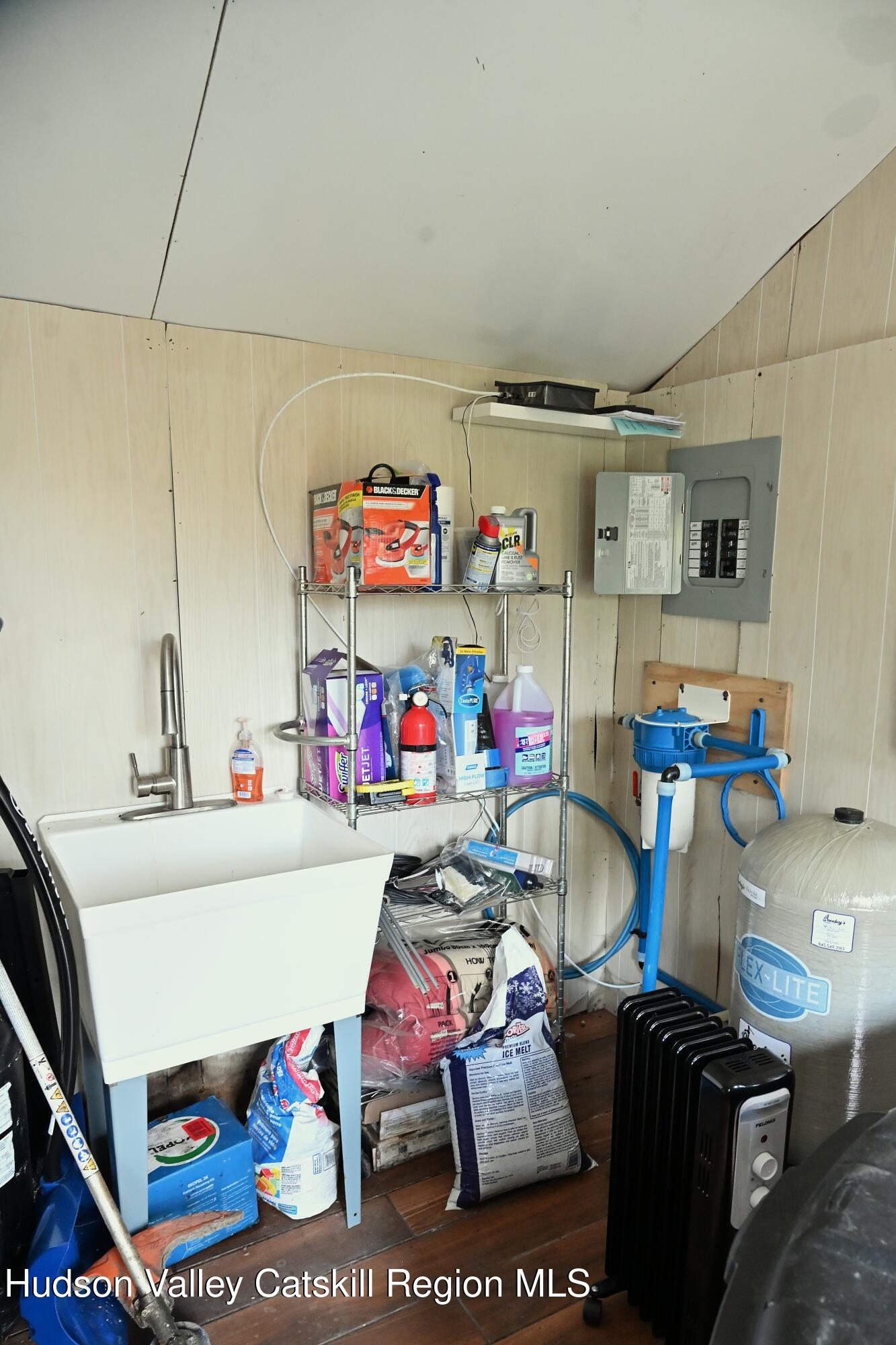 275 Creek Locks Road Rosendale, NY 12472 - Photo 19 of 23 a storage room with furniture and a storage