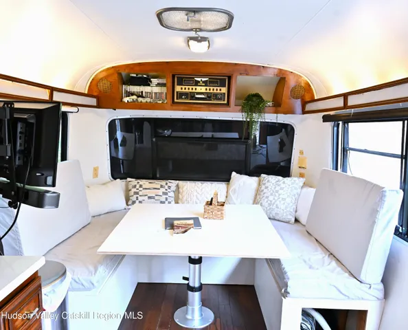 a living room with furniture and window