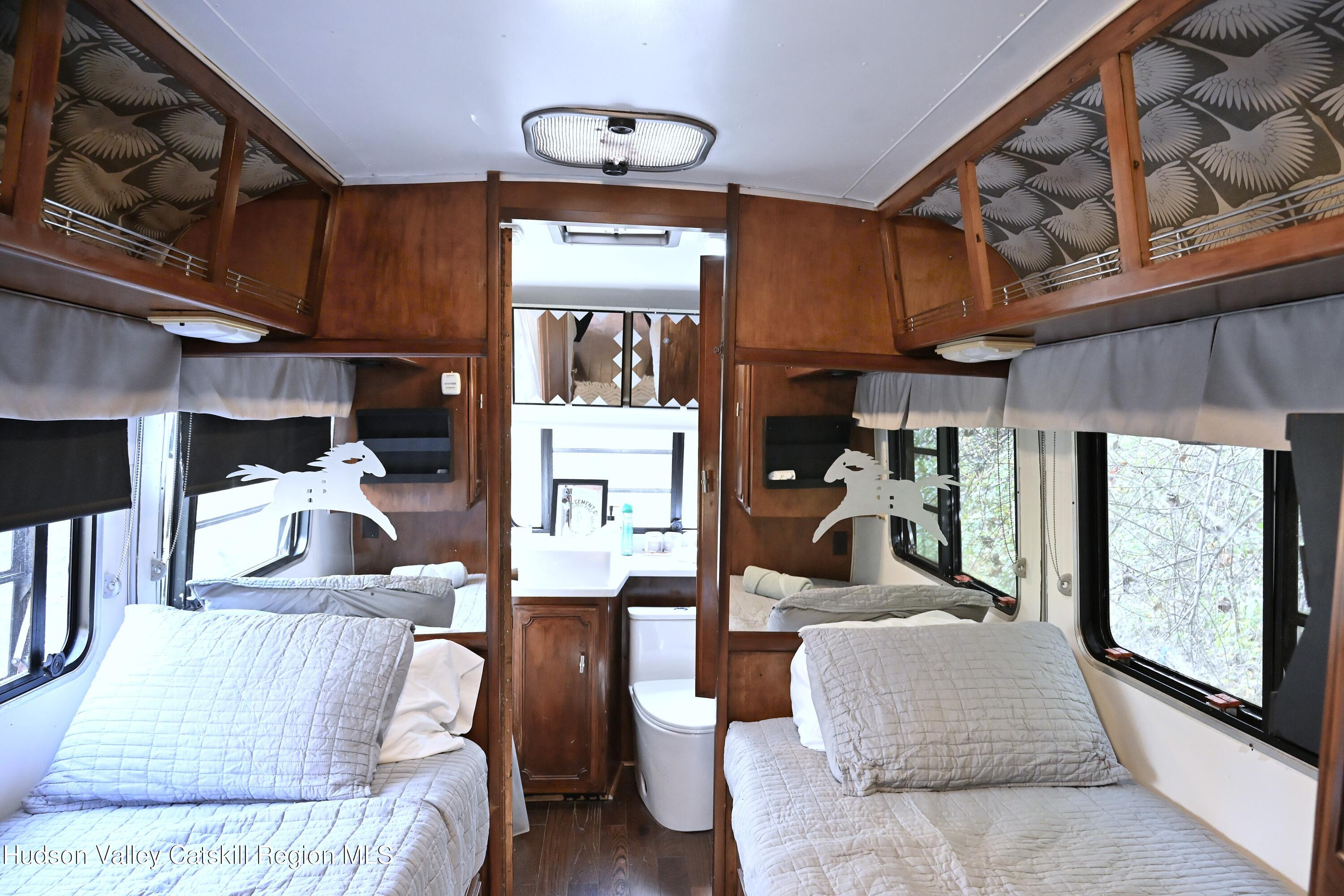 275 Creek Locks Road Rosendale, NY 12472 - Photo 9 of 23 a living room filled with furniture and a large window