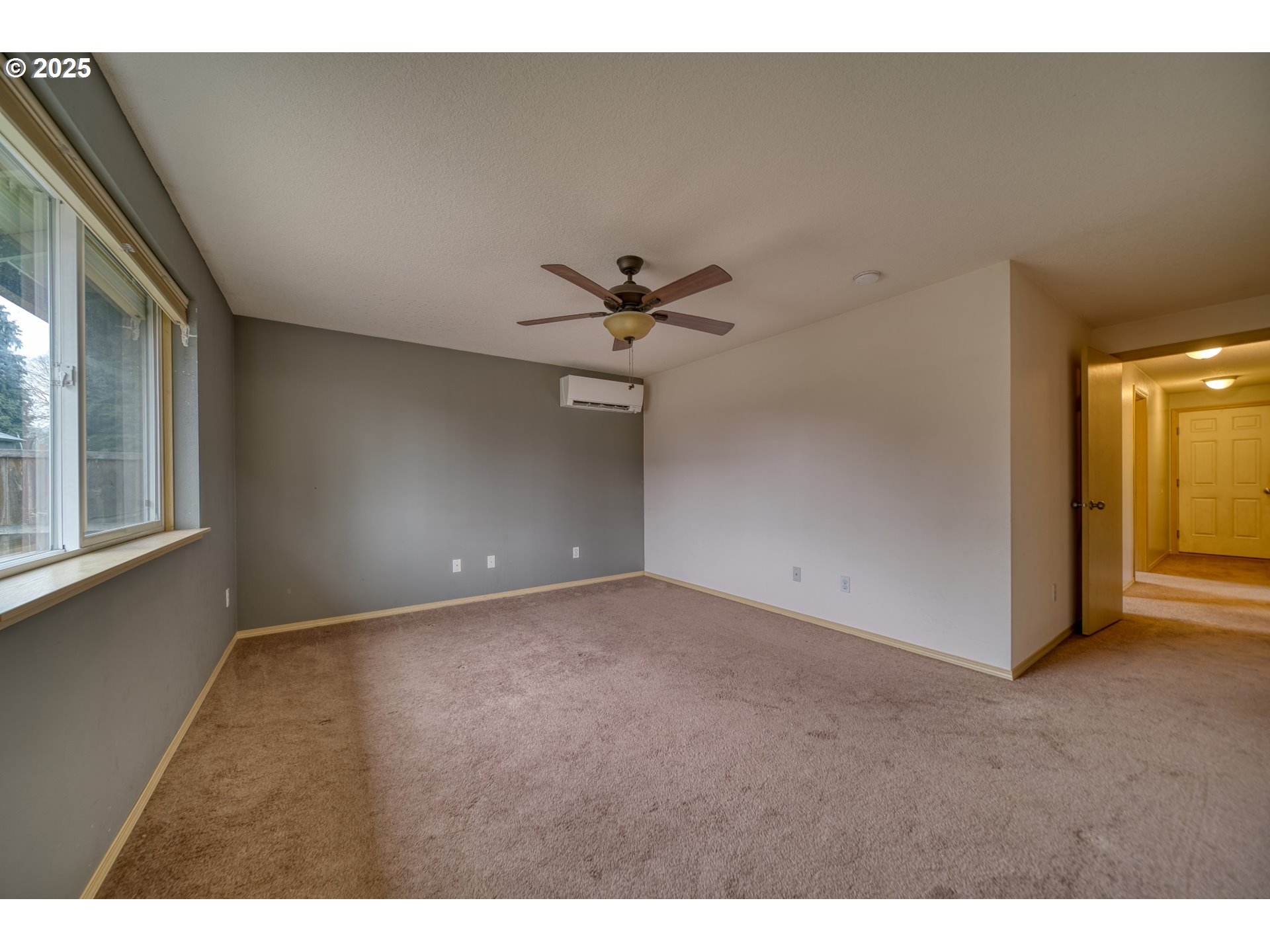 34122 Adison Street Scappoose, OR 97056 - Photo 15 of 41 a view of an empty room with a ceiling fan