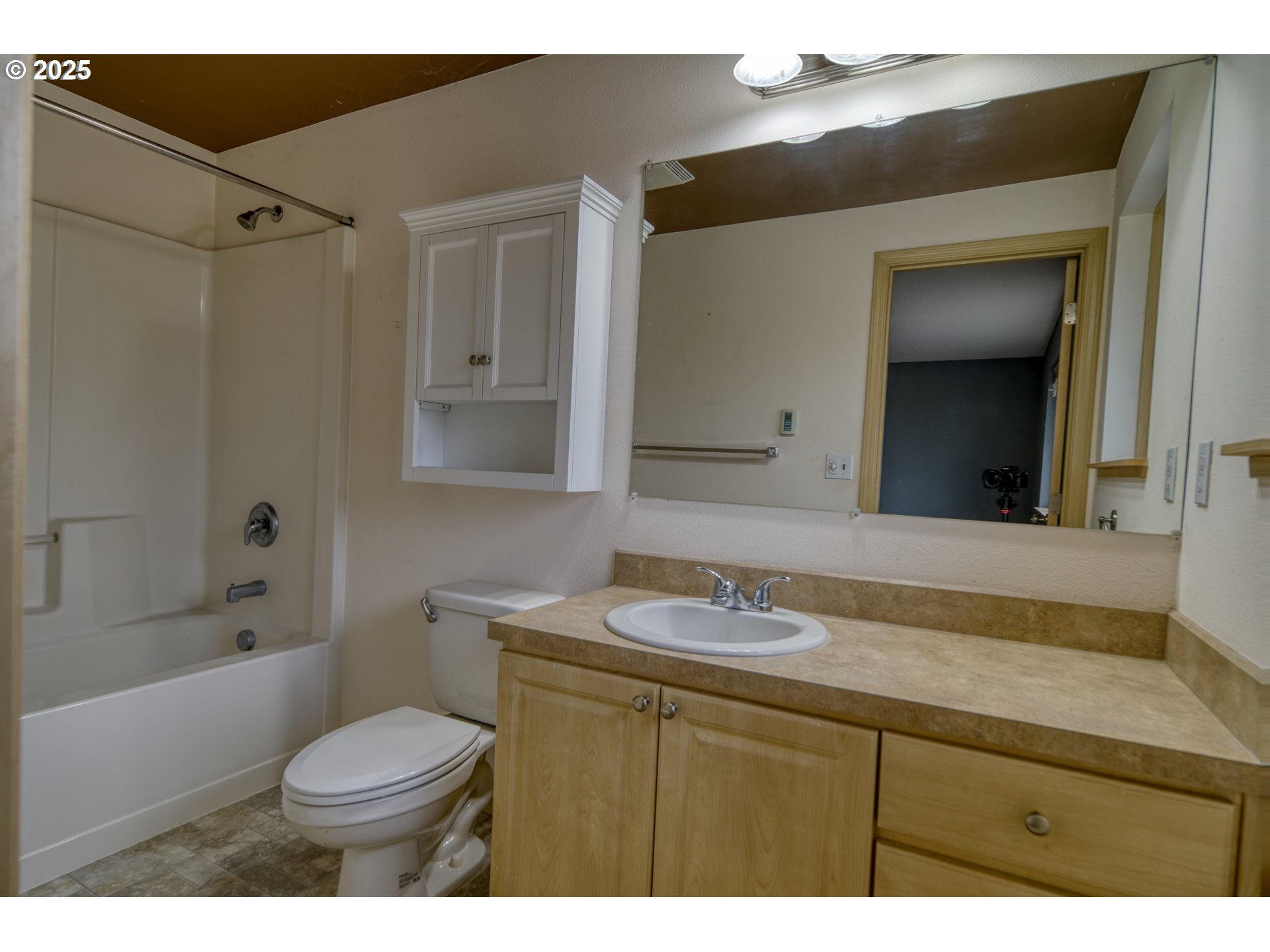 34122 Adison Street Scappoose, OR 97056 - Photo 18 of 41 a bathroom with a sink a toilet and shower