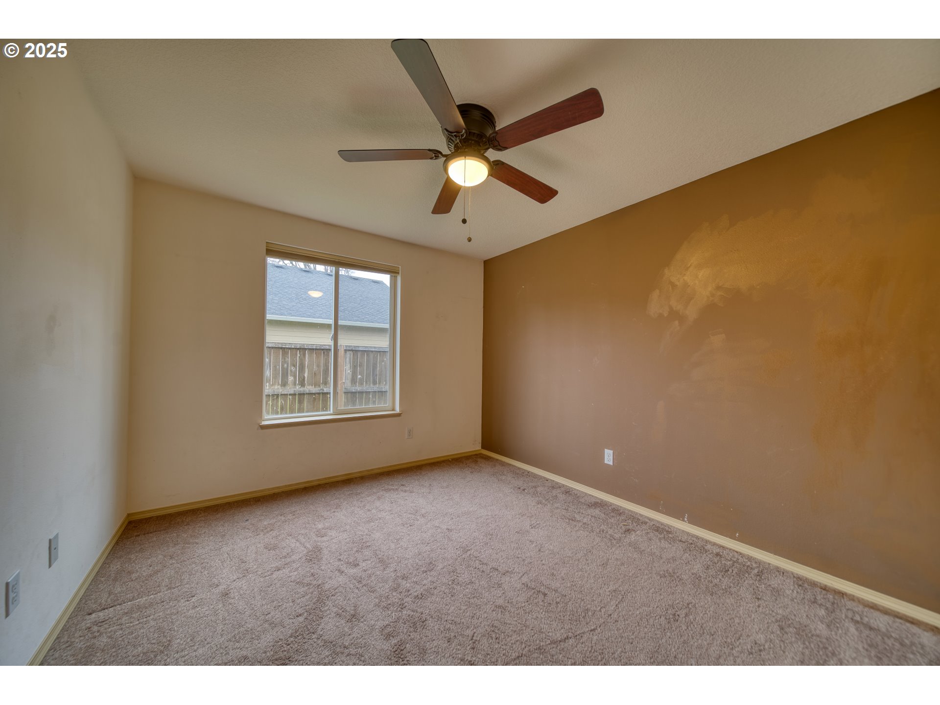 34122 Adison Street Scappoose, OR 97056 - Photo 20 of 41 a view of an empty room with a window
